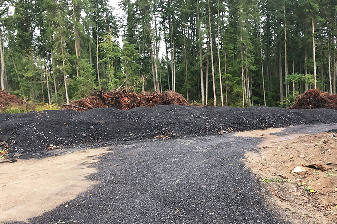 WEAN digs into mounds of discarded asphalt