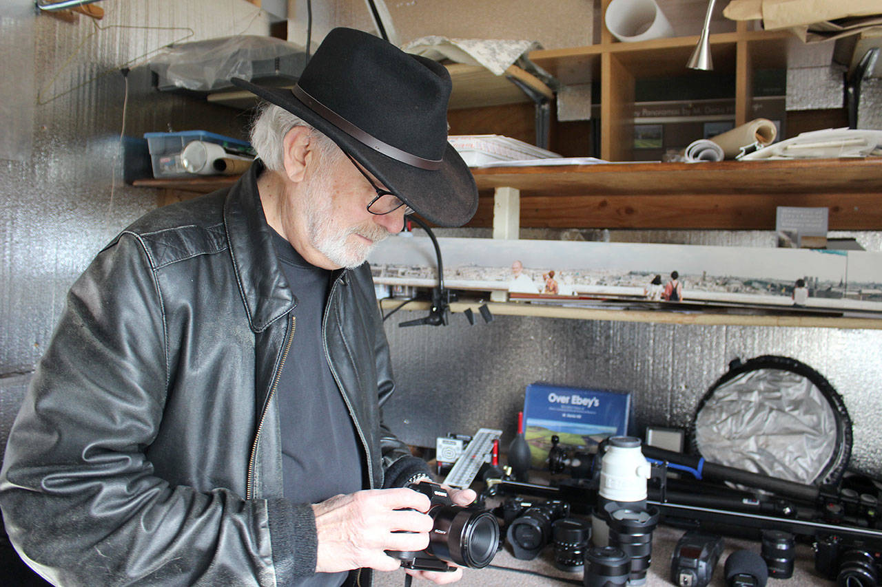 Coupeville photographer Denis Hill, known for his panoramic images of Ebey’s National Reserve, is also part of the 15th Annual Artists Summer pen Studio Tour (Photo by Patricia Guthrie/Whidbey News Group)&lt;address&gt; &lt;/address&gt;