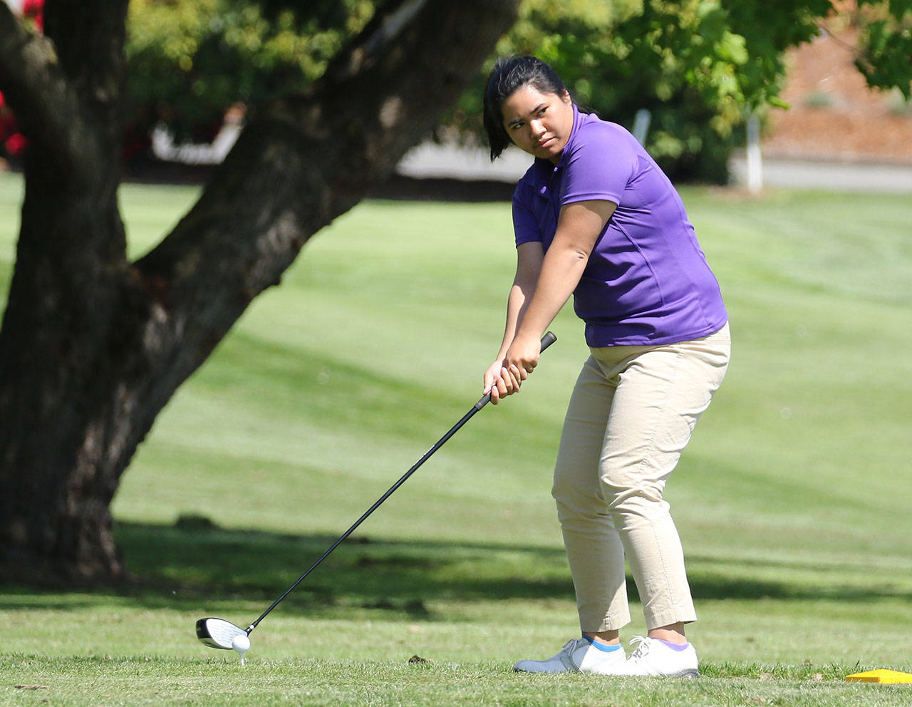 Senior Jenna Flores will provide leadership for the Oak Harbor girls golf team.(Photo by John Fisken)