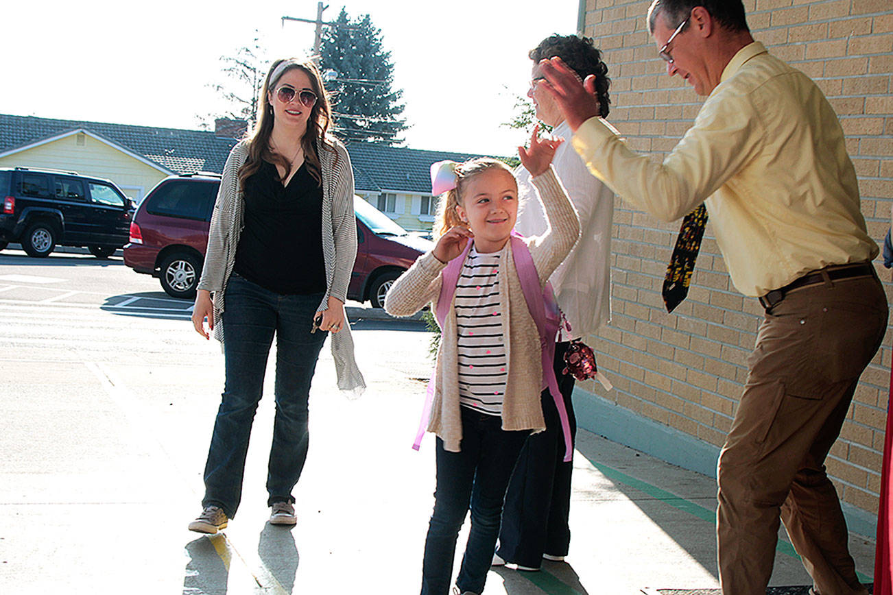 A first-day high five for the new school year