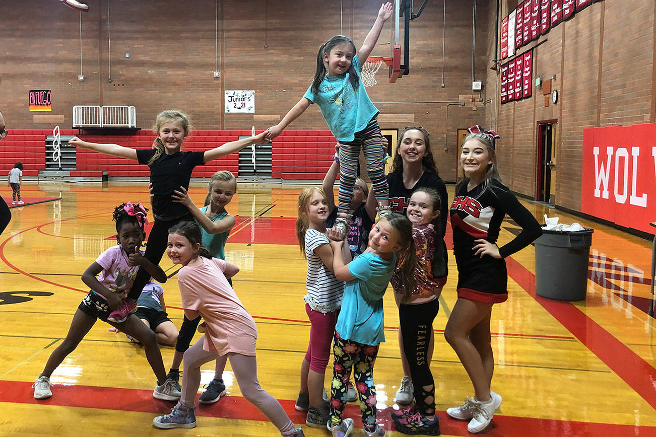 Island youth spread their spirit at camp / Cheer