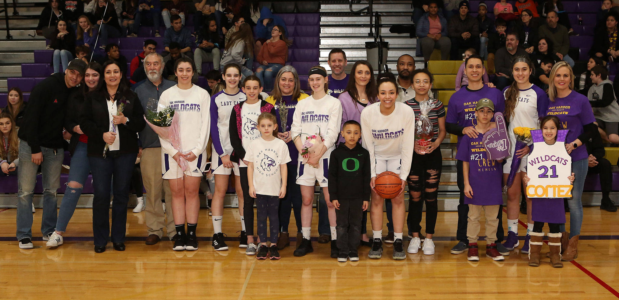 Oak Harbor’s seniors and their families were honored before Friday’s game with Marysville Getchell.(Photo by John Fisken)