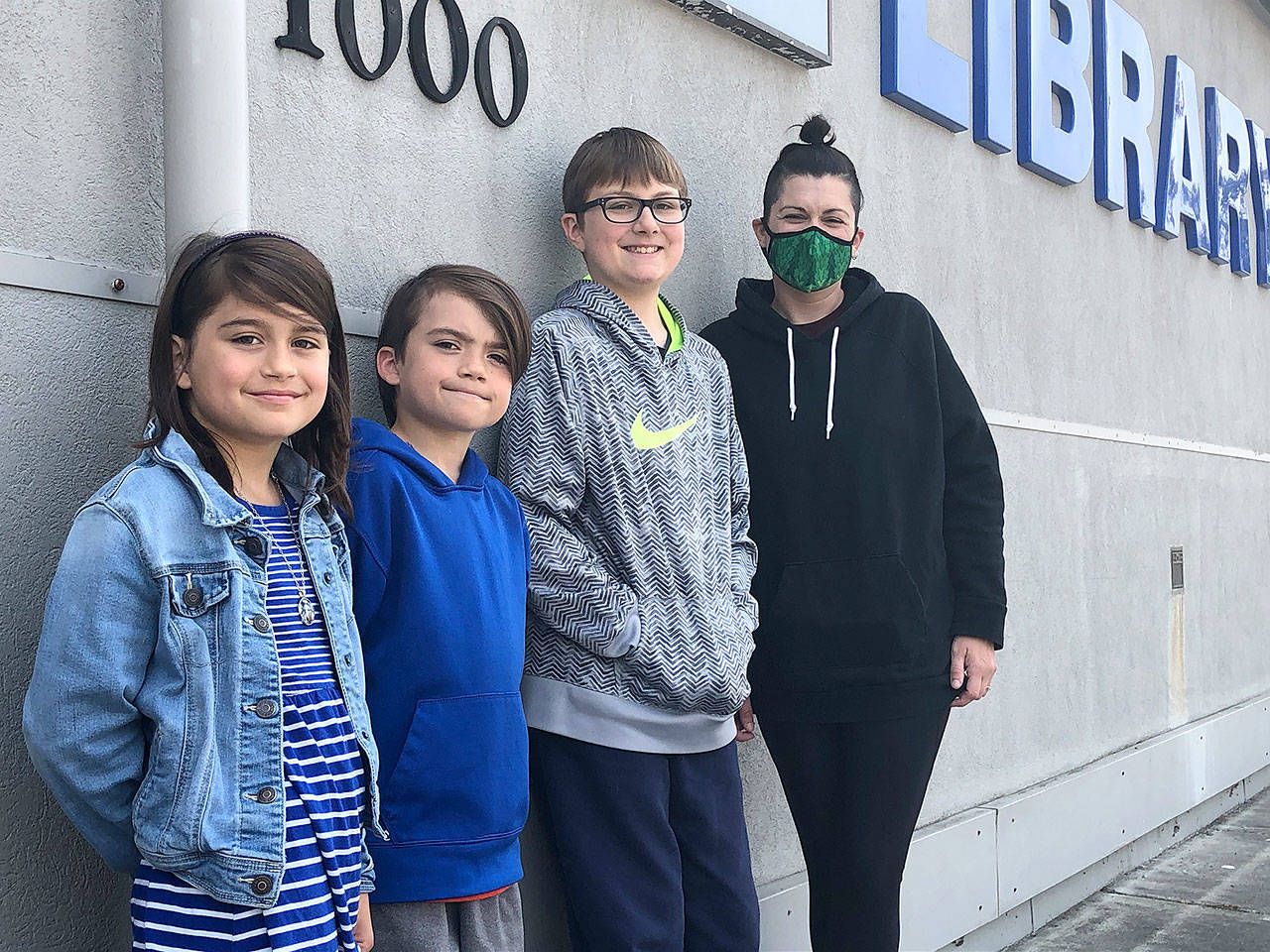 Everly, Calder, Julian and Rachel Shaw are huge fans of Sno-Isle Libraries, especially the Oak Harbor Library. Photo provided.