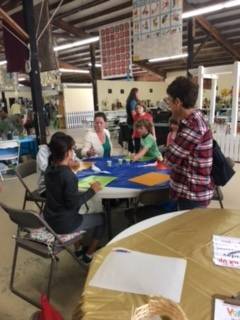 Kids decorate cookies at the 2019 Whidbey Island Fair. (Photo provided)