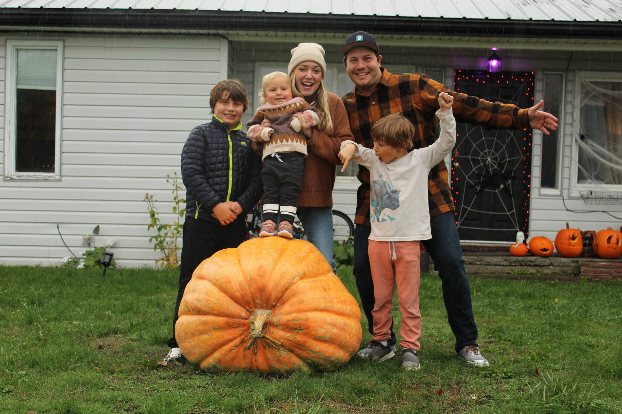 Photo by Karina Andrew/Whidbey News-Times
Courtnie Deckwa, James Cardinal and their children, Aiden, 10, Matilda, 1, and Kai, 6, pose with their prize.