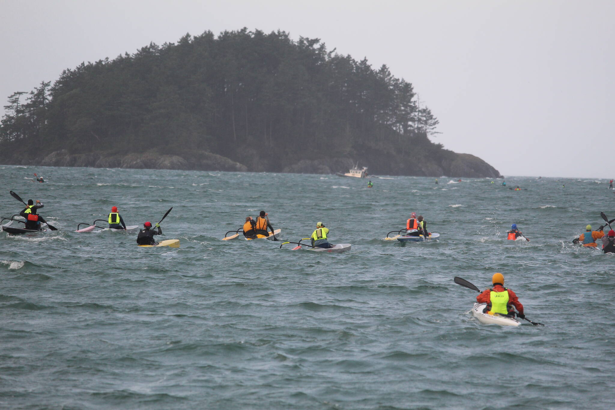 Photo by Karina Andrew/Whidbey News-Times
Strong winds made for choppy waters near Deception Pass Saturday morning, as around 100 rowers and paddlers gathered at Bowman Bay for the 15th year of the Deception Pass Dash. Unfortunately, the annual winter challenge was cut short as racers struggled to reach Deception Island, and race officials eventually determined it was unadvisable to attempt to complete the course. Racers were encouraged to turn around, and the event came to an early end.