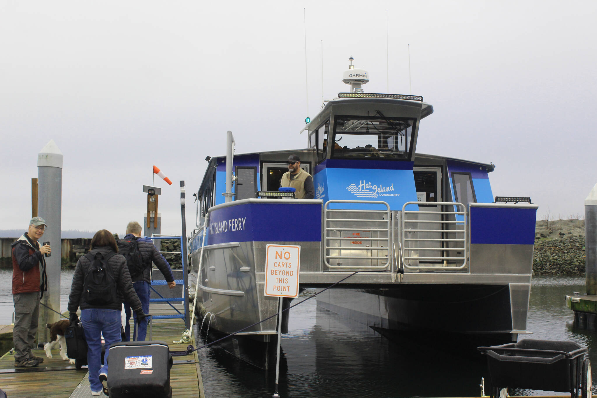 Hat Islanders board the new Hat Island ferry in December. (Photo by Wendy Leigh)