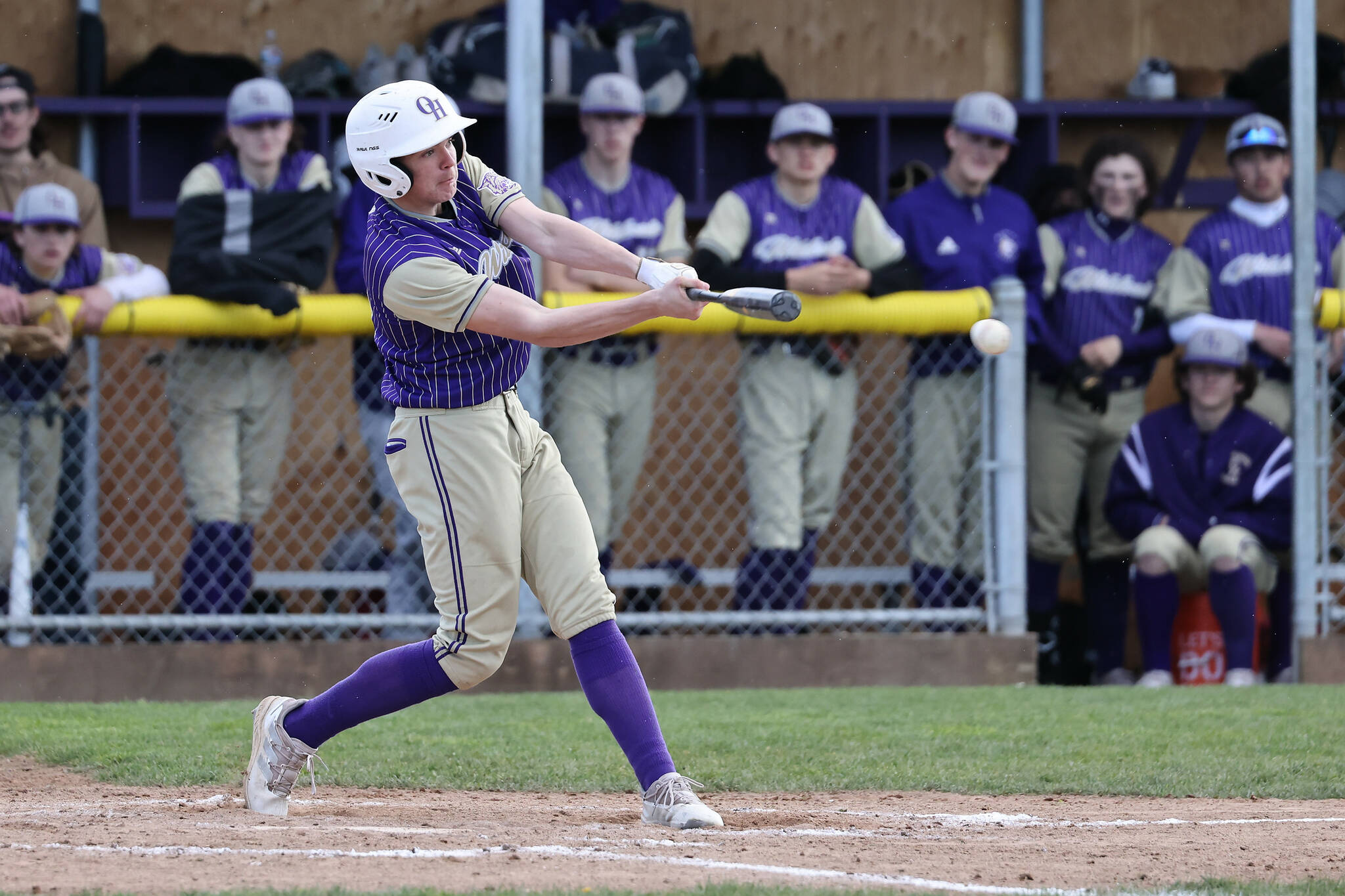 Oak Harbor baseball player Shawn Day bats. (Photo by John Fisken)