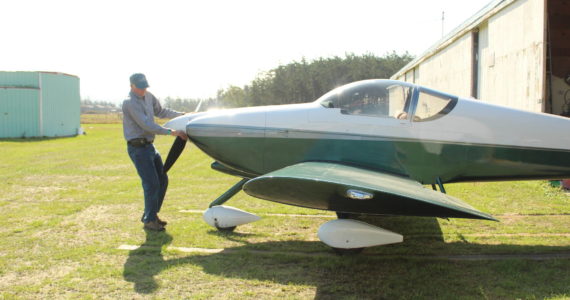 Local pilot Don Meehan readies his plane for takeoff.