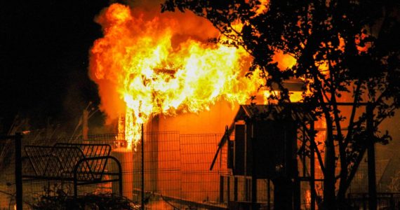 Photo by Bryan Fick/WestCoast Fire Media
A fire consumed a shed on an Oak Harbor property Wednesday night, killing two baby goats that were living inside.