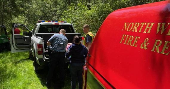 North Whidbey Fire and Rescue photo
First responders load a woman with potential injuries into a vehicle after she was thrown from a horse Thursday morning.