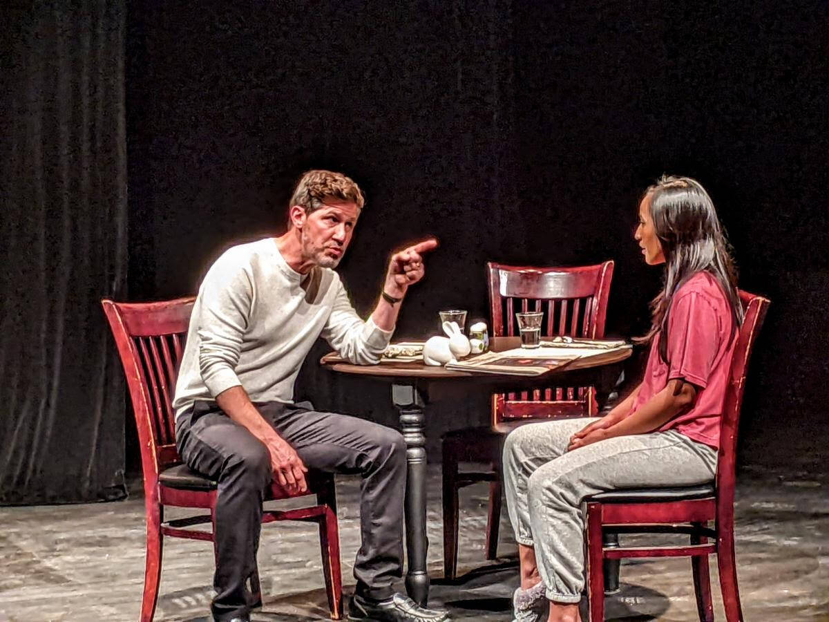 Photo by Sue Frause
Eric Mulholland and Rheanna Atendido, who play father Paul and daughter Dezzy, have a conversation over the dinner table.