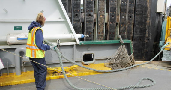 Photo by Kira Erickson/South Whidbey Record
A ferry worker ties up a vessel at the Clinton terminal.