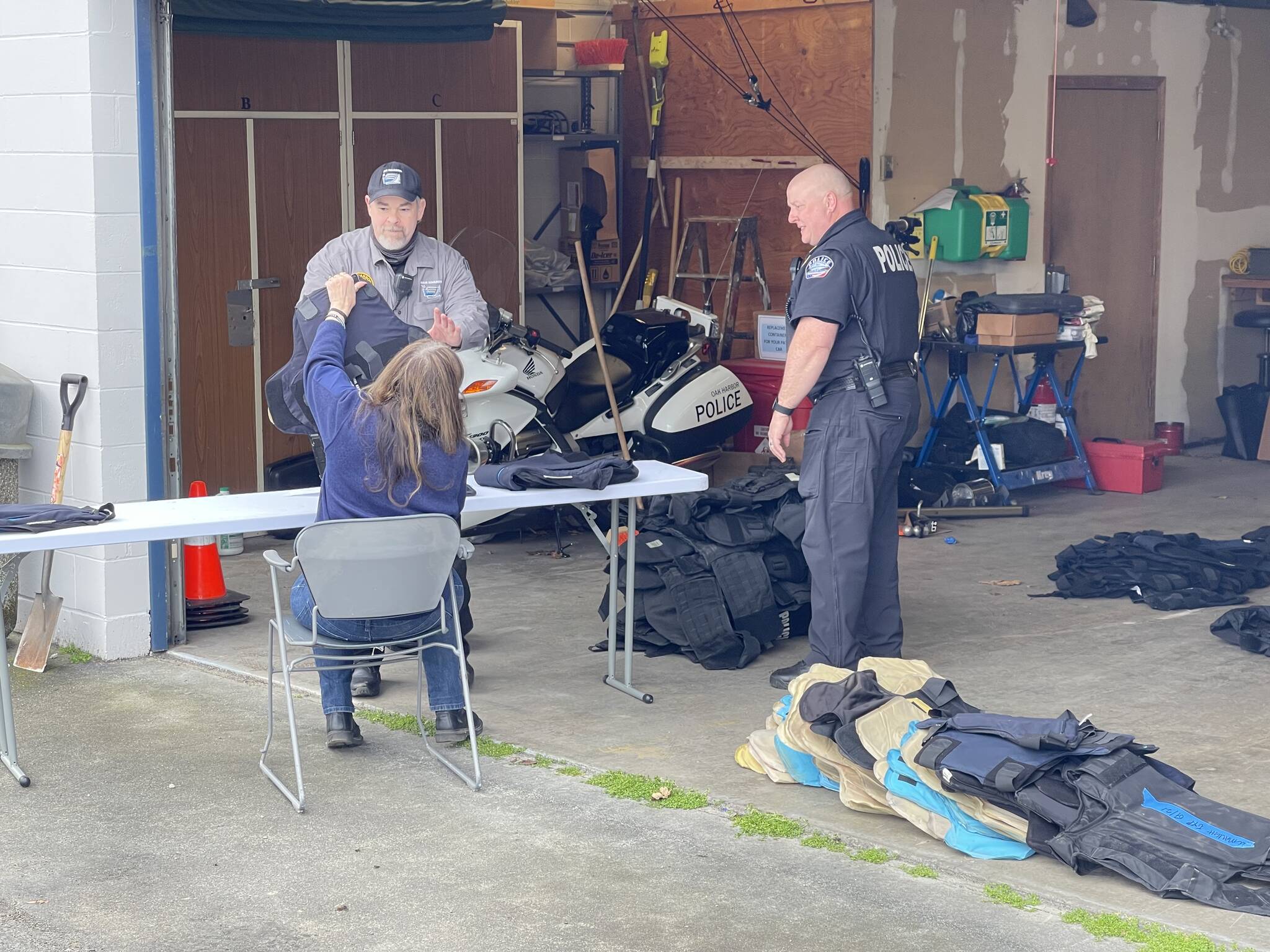 The Oak Harbor Police Department sorts through expired bulletproof vests. (Photo provided by Oak Harbor Police Department)