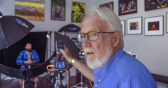 Photo by David Welton
Michael Holtby, right, prepares to take a photo of Jasper Hein in his studio for the Whidbey Beard Project.