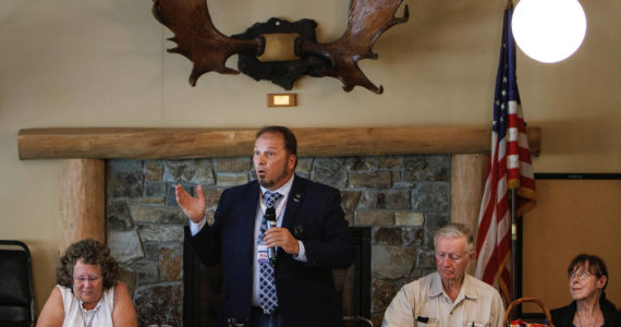 Photo by David Welton
Republican Tim Hazelo, a candidate for Island County commissioner, addresses attendees at a recent Old Goats — Fully Informed Voters luncheon. Left, Democrat and incumbent Janet St. Clair. Right, Rufus and Reece Rose, organizers of the discussion group.