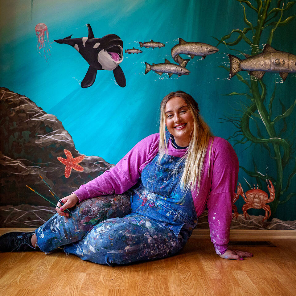 Photos by David Welton
Carly Sarver is the artist behind a brand-new mural depicting the marine wildlife of the Salish Sea. South Whidbey resident John Knowlton commissioned the Stanwood muralist to paint what was formerly an accent wall in his new home.