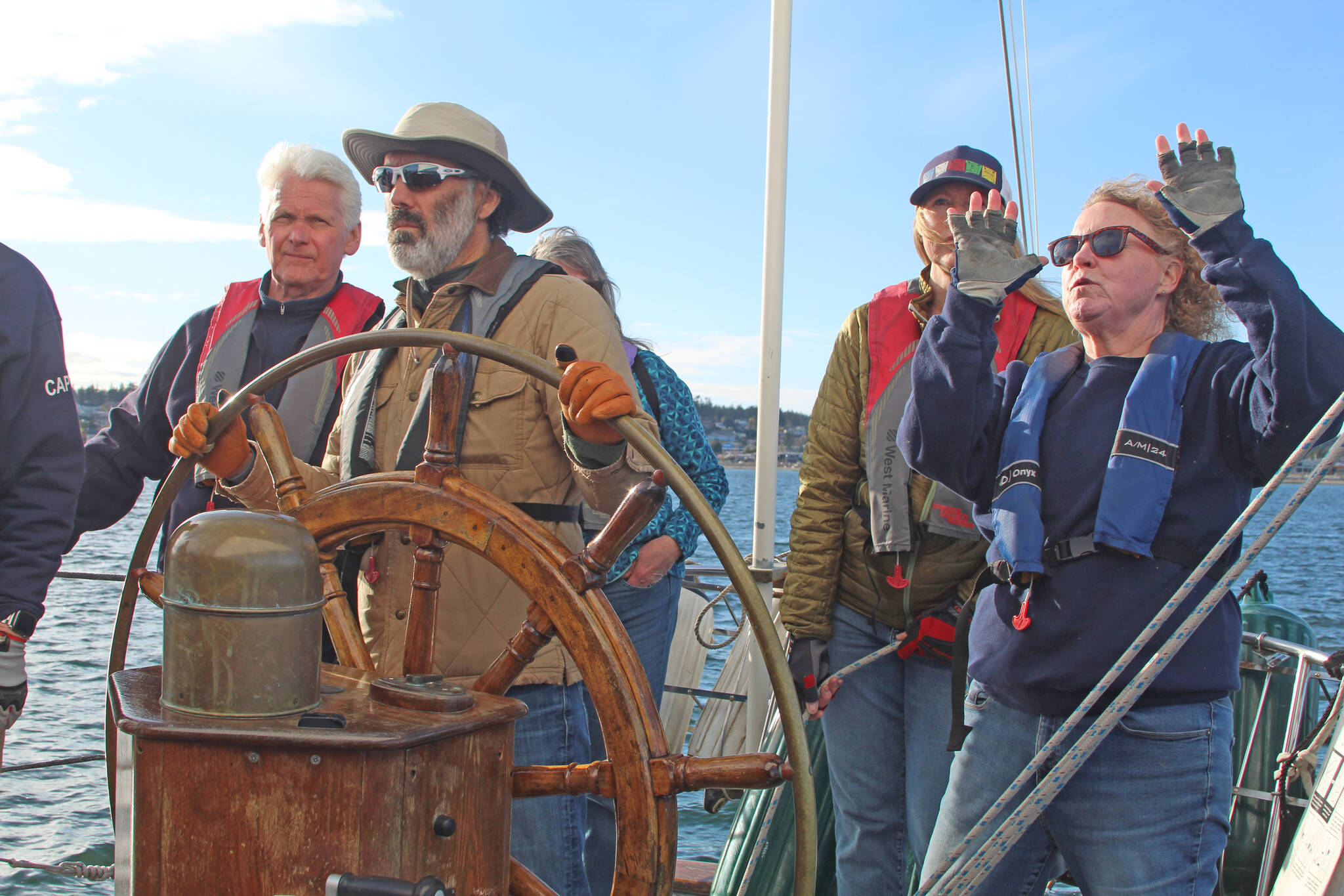 Volunteer crew members practice their various duties during a training sail on the Suva April 24. (Photo by Karina Andrew/Whidbey News-Times)