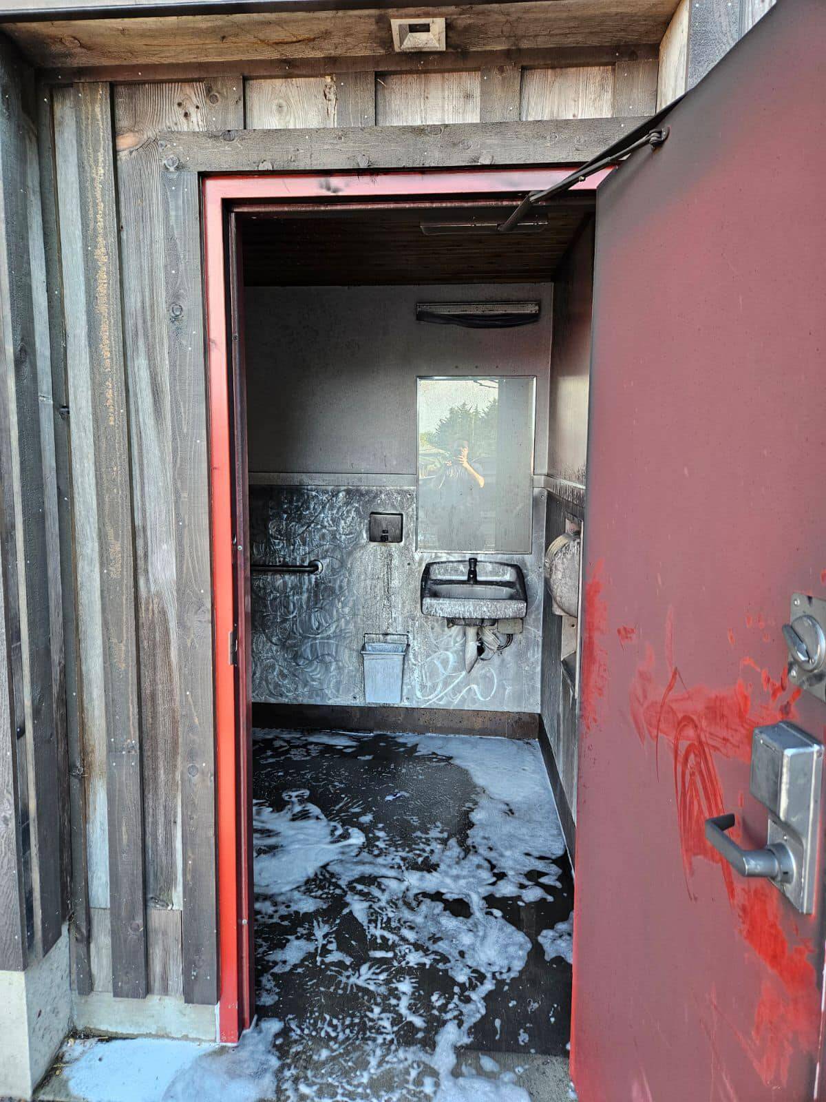 A fire destroyed a public restroom located in the historic Holbrook Barn in Coupeville over the weekend. (Photo provided)