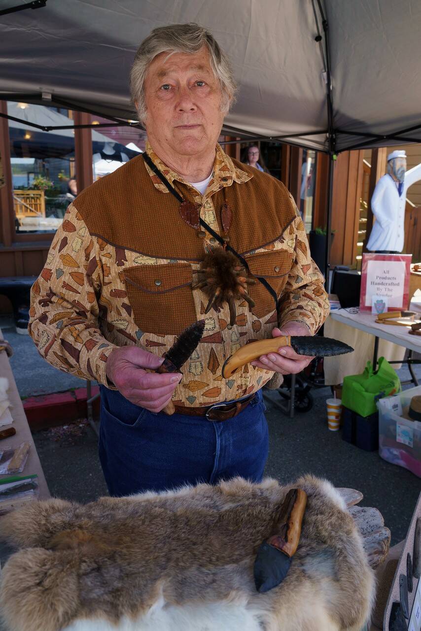 Photo by David Welton
Oak Harbor resident Robert Bower sells knives at the Penn Cove Water Festival in 2023.