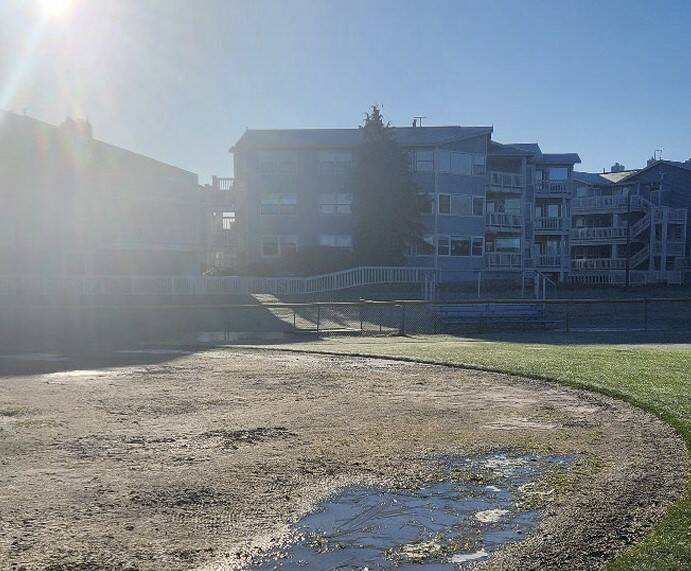 The lost material at Windjammer Park this past season created lips on the grass boundaries, which is a tripping hazard and interferes with the game. (Photo provided)