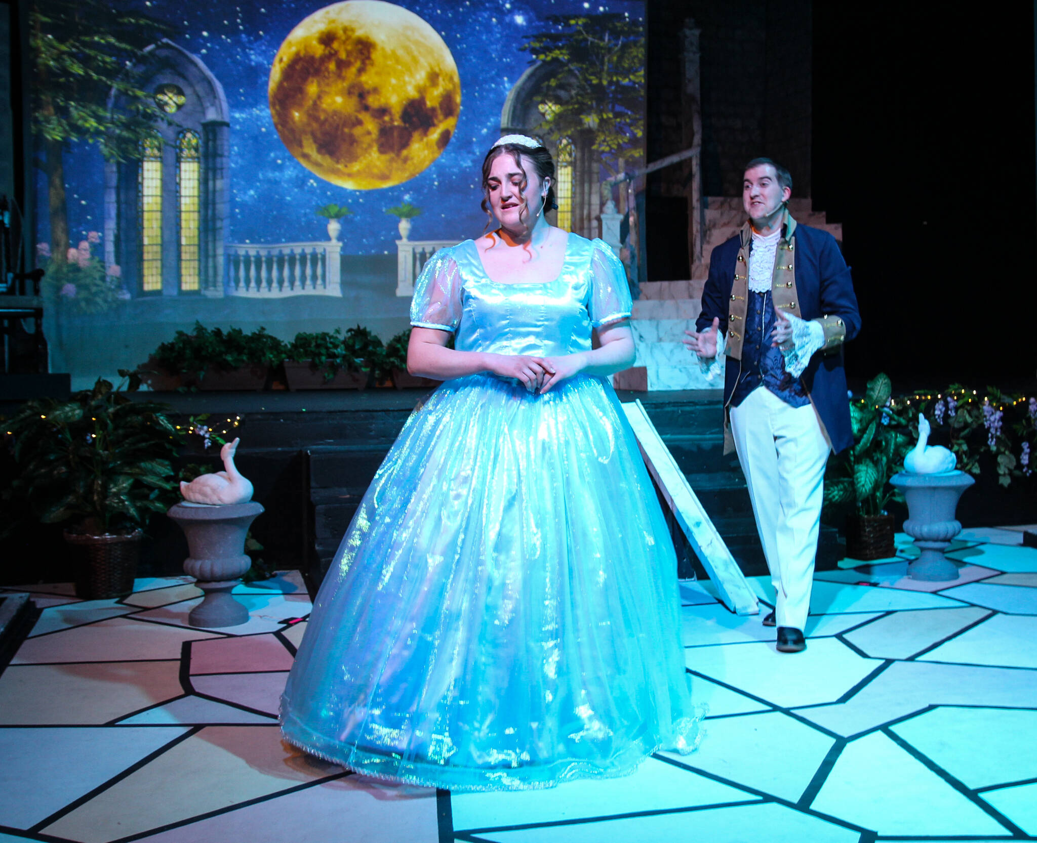 Cinderella (Gabrielle Eaton) talks with Prince Christopher (Jordan Kingma) in the royal gardens. (Photo by Luisa Loi)