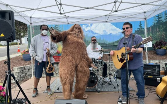 Garry the Sasquatch jams with the band at the 2023 Sasquatch Walk in Oak Harbor. (Photo courtesy of Teresa Besaw)