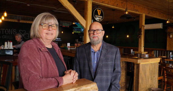 Photo by Sam Fletcher
Mercedes Fulwiler, left, and Jason Tritt, co-owners of Barrington’s Irish Bar & Grill on Pioneer Way, pose before their grand opening.
