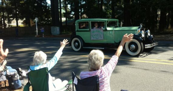 Photo provided
Onlookers wave to veterans during a previous Whidbey Island Fair parade.