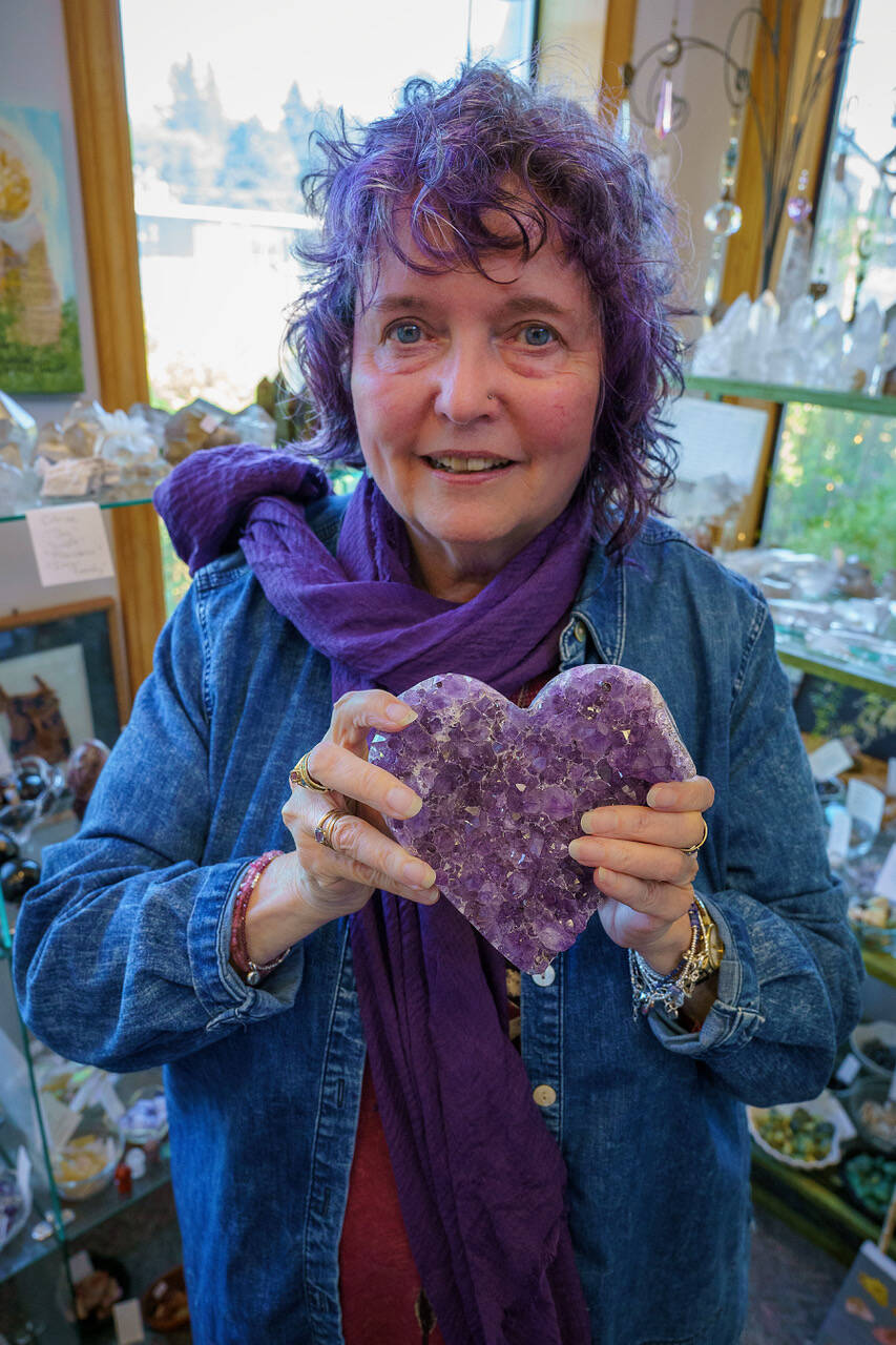 Llynya Carey with a heart-shaped amethyst geode. (Photo by David Welton)