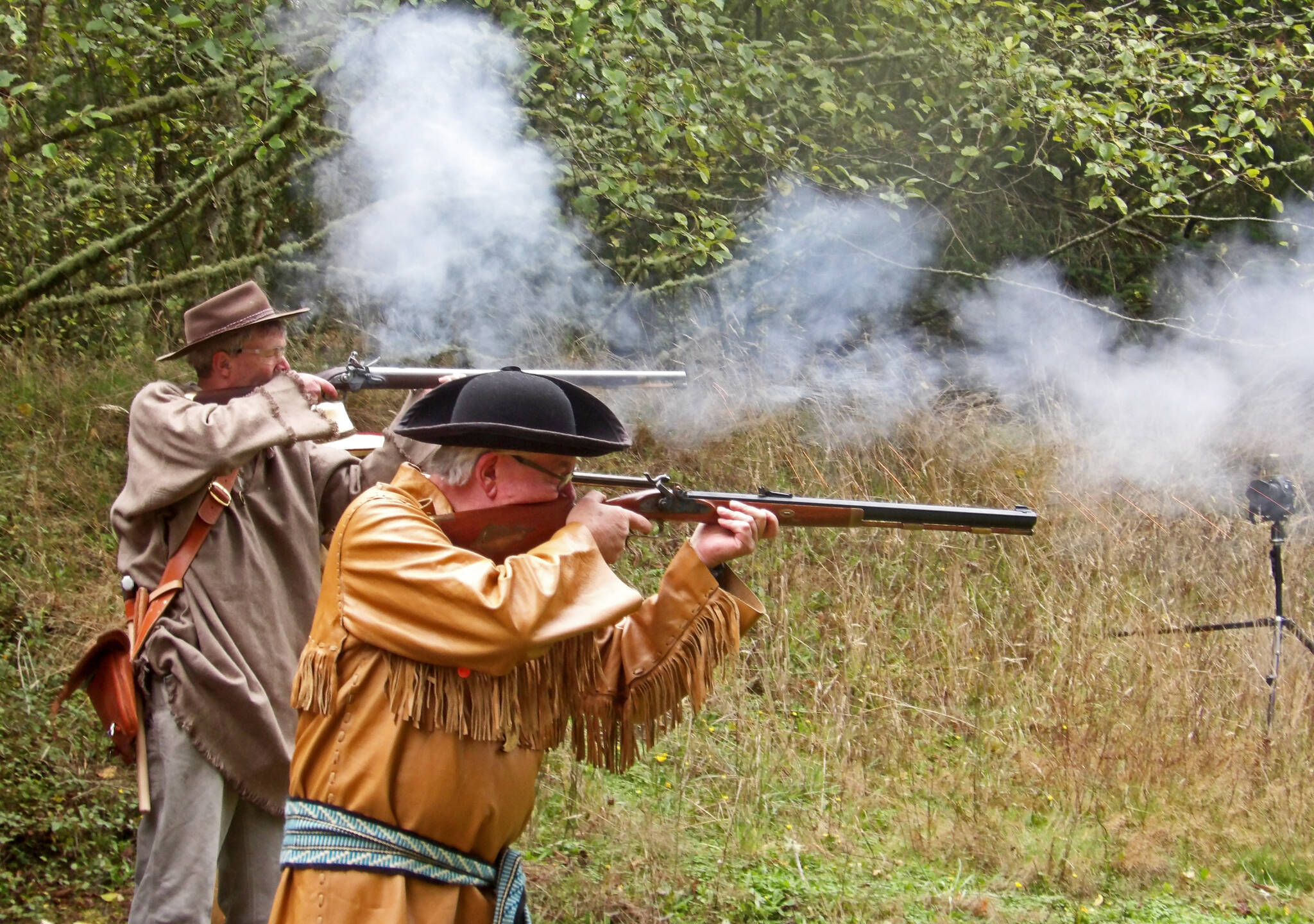 Rendezvous participants shoot targets while wearing clothes based on the fur trade era. (Photo by Roger Robertson)