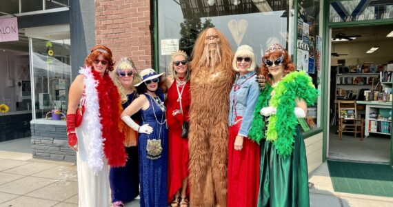 Photo by Teresa Besaw
The Magnificent Crab Queens and Bigfoot met at last year’s By the Harbor market.