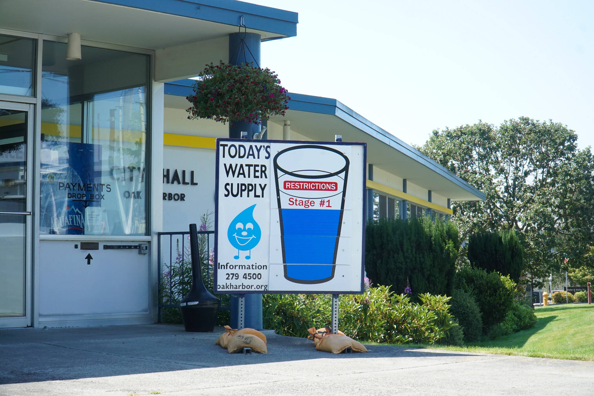 Oak Harbor’s Water Supply signs recently dropped to Stage 1, recommending water conservation practices. (Photo by Sam Fletcher)