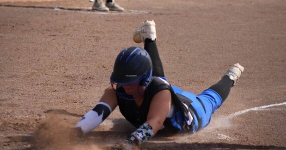 A player for the Island Vipers slides into a base during a recent tournament. The Island Vipers are based on Whidbey and are fielding two teams for the season that starts in September. Photo courtesy of Jodi Strevel.