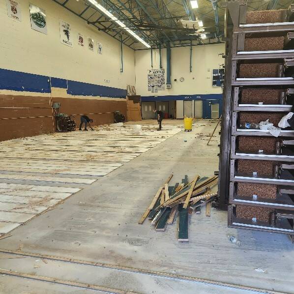 Photo provided
The gym floorboards are removed to address the water damage.