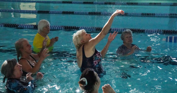 Carol Parbs hits the volleyball at the John Vanderzicht Memorial Pool Monday morning. (Photo by Sam Fletcher)