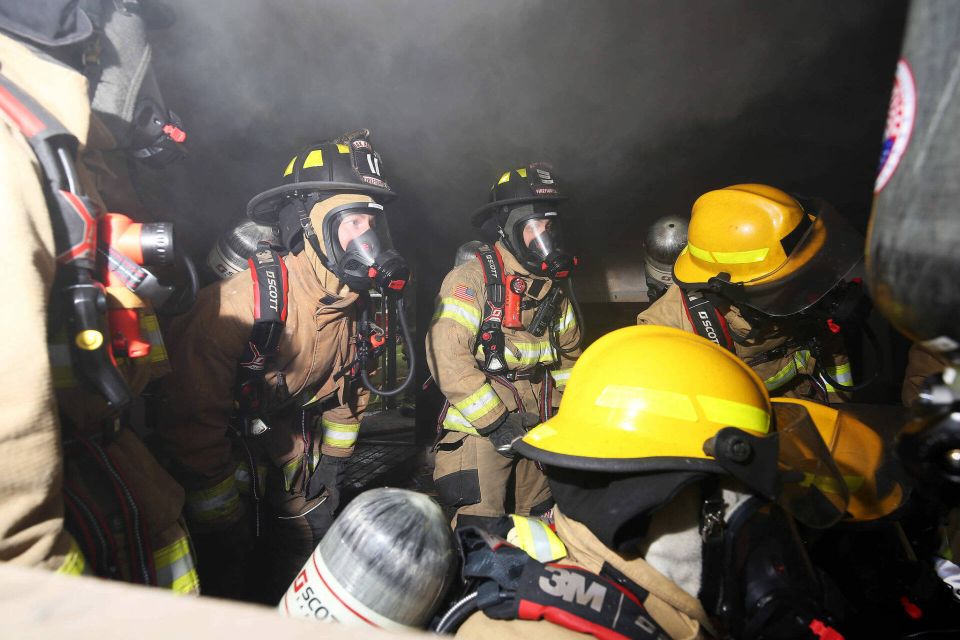 Firefighters conduct a live burn training in 2021. (Photo by John Fisken)