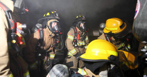 Firefighters conduct a live burn training in 2021. (Photo by John Fisken)