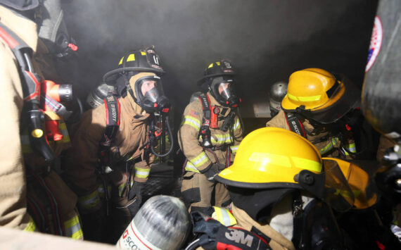 Firefighters conduct a live burn training in 2021. (Photo by John Fisken)