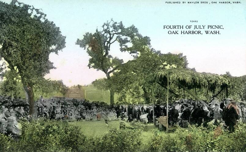 Fourth of July Picnic Oak Harbor, Wash Color-tinted photo postcard of the July 4th, 1894 celebration in Smith Park. Produced by noted Oak Harbor pioneers and merchants the Maylor Brothers.(Island County Historical Society, Library and Archives, 2015.26.2)