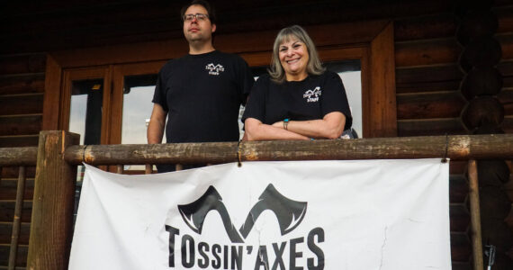 Photo by Sam Fletcher
Daniel Caldwell and Donna DeBonis stand before Tossin’ Axes on Midway Blvd. on Friday.