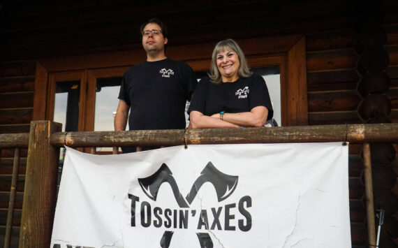 Photo by Sam Fletcher
Daniel Caldwell and Donna DeBonis stand before Tossin’ Axes on Midway Blvd. on Friday.