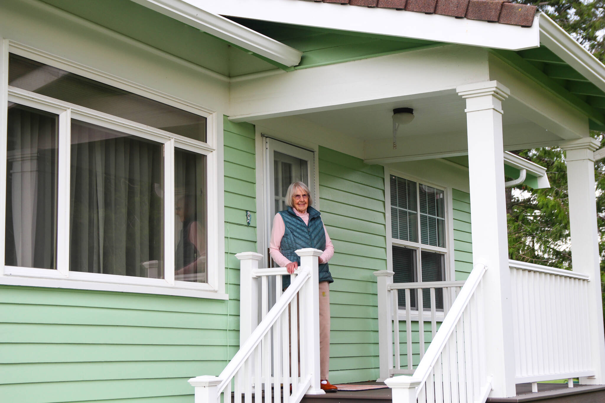 (Photo by Luisa Loi)
Avis Rector stands on the porch of the house where she was born 91 years ago.