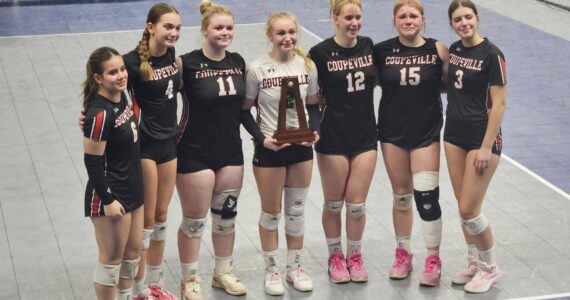 Photo provided
Seniors of the Coupeville High School volleyball squad pose with their trophy.