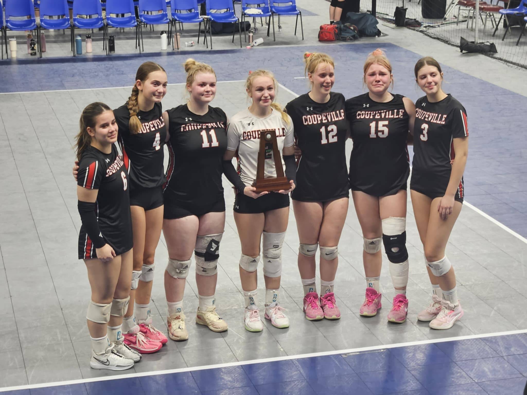 (Photo provided)
Seniors of the Coupeville High School volleyball squad pose with their trophy.