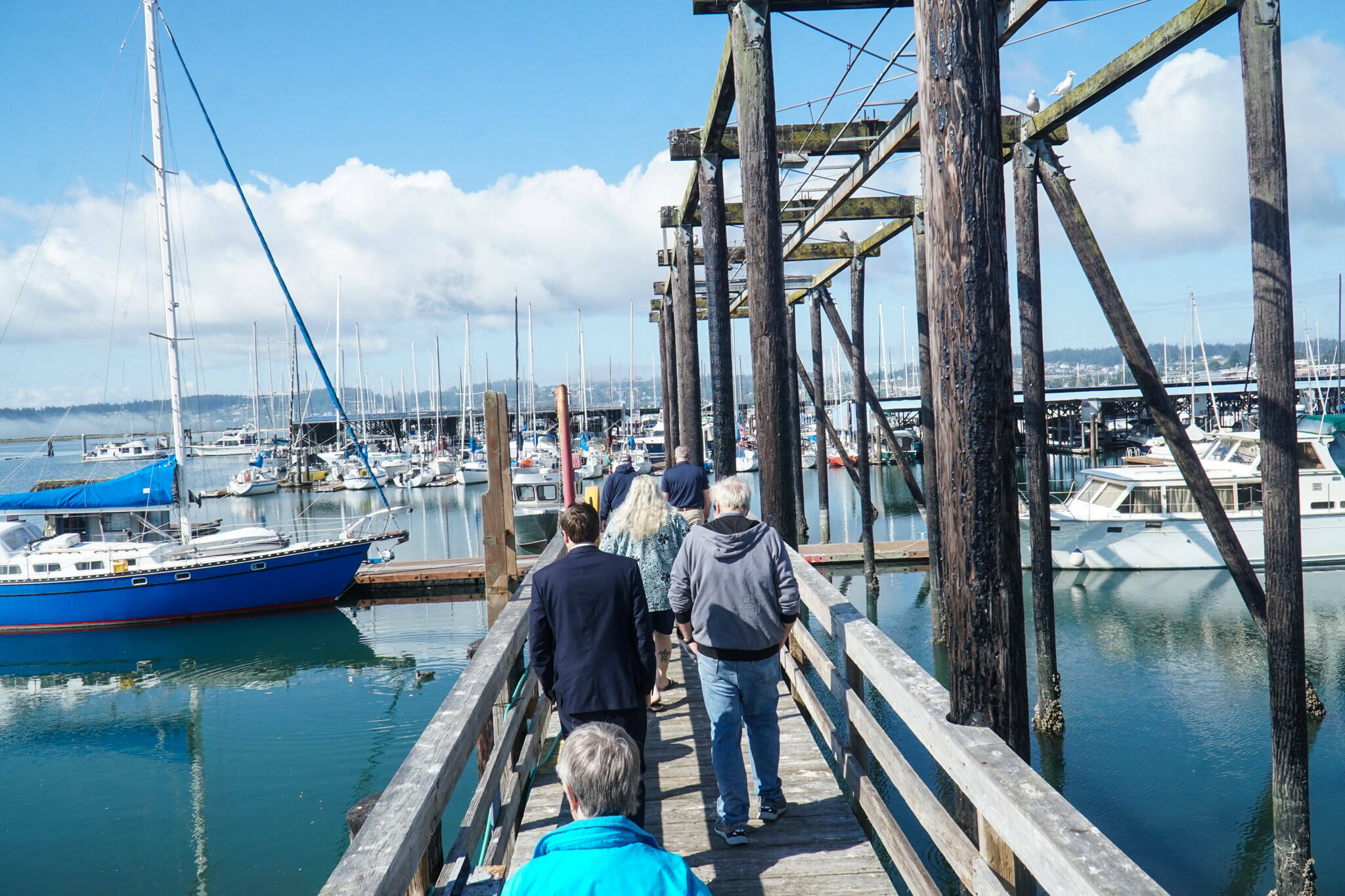 City staff tour the Oak Harbor Marina. (Photo by Sam Fletcher)