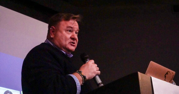 Oak Harbor Mayor Ronnie Wright addresses Chamber of Commerce luncheon attendees with a State of the City address on Thursday. (Photo by Sam Fletcher)