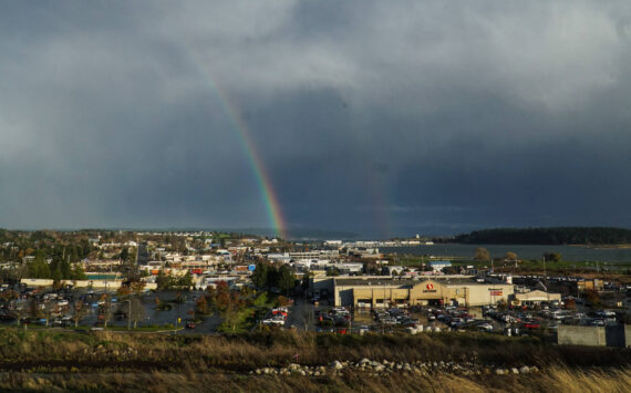 Photo by Sam Fletcher
A double rainbow arches over a housing development in Oak Harbor on Friday.