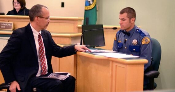 Chief Criminal Deputy Prosecutor Eric Ohme questions a state trooper during a vehicular homicide case.