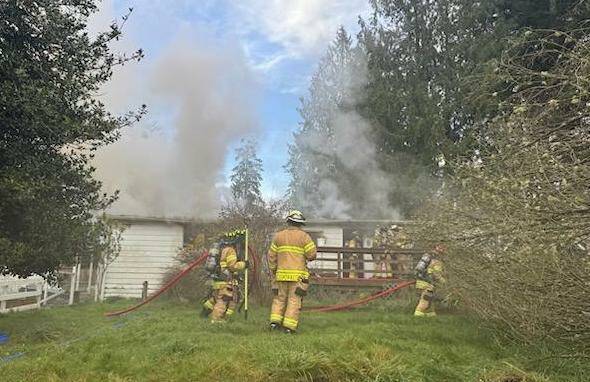 (Photo provided by South Whidbey Fire/EMS)
A fire devastated a home Wednesday morning.